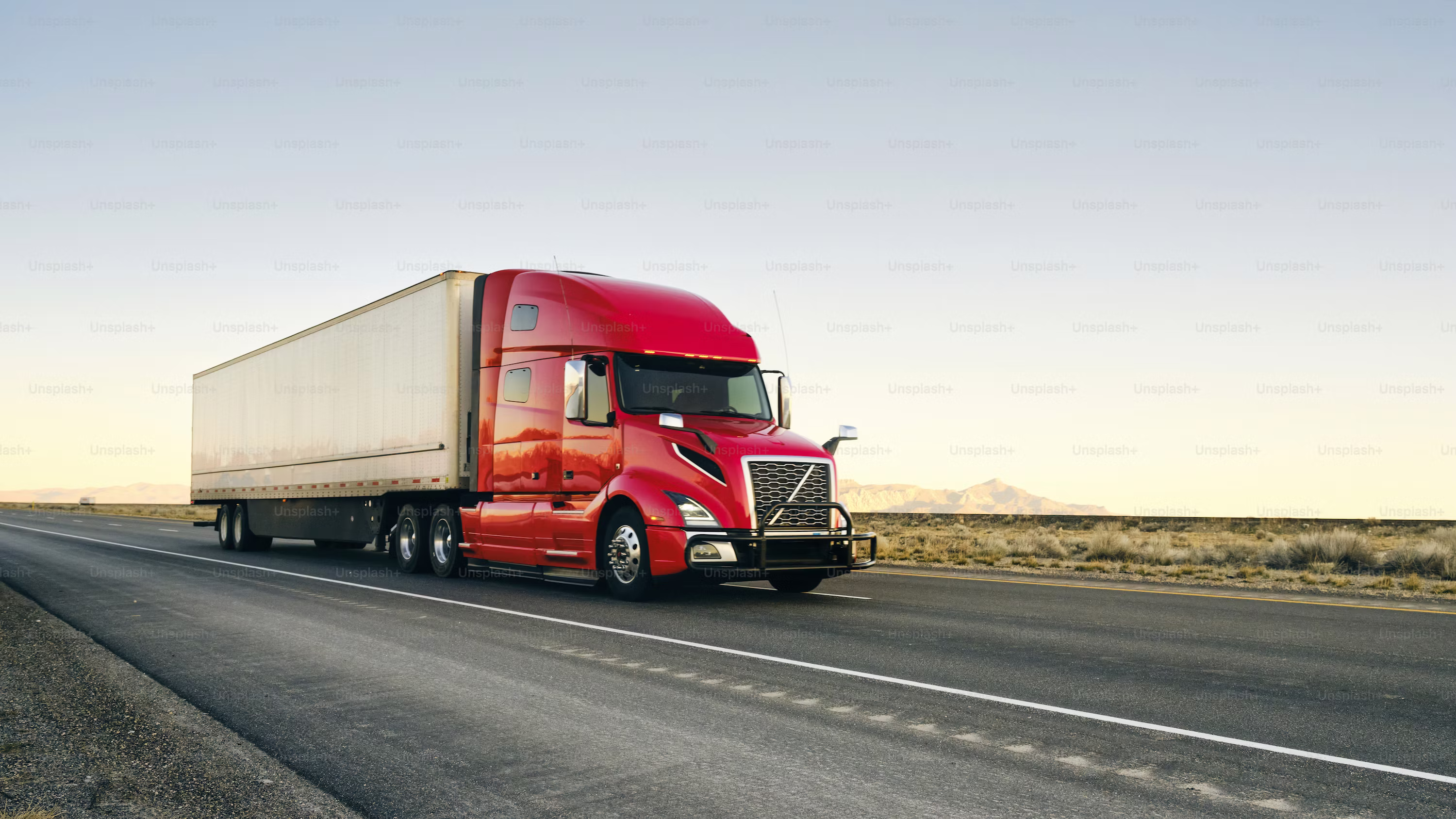 American semi-trucks parked on the highway